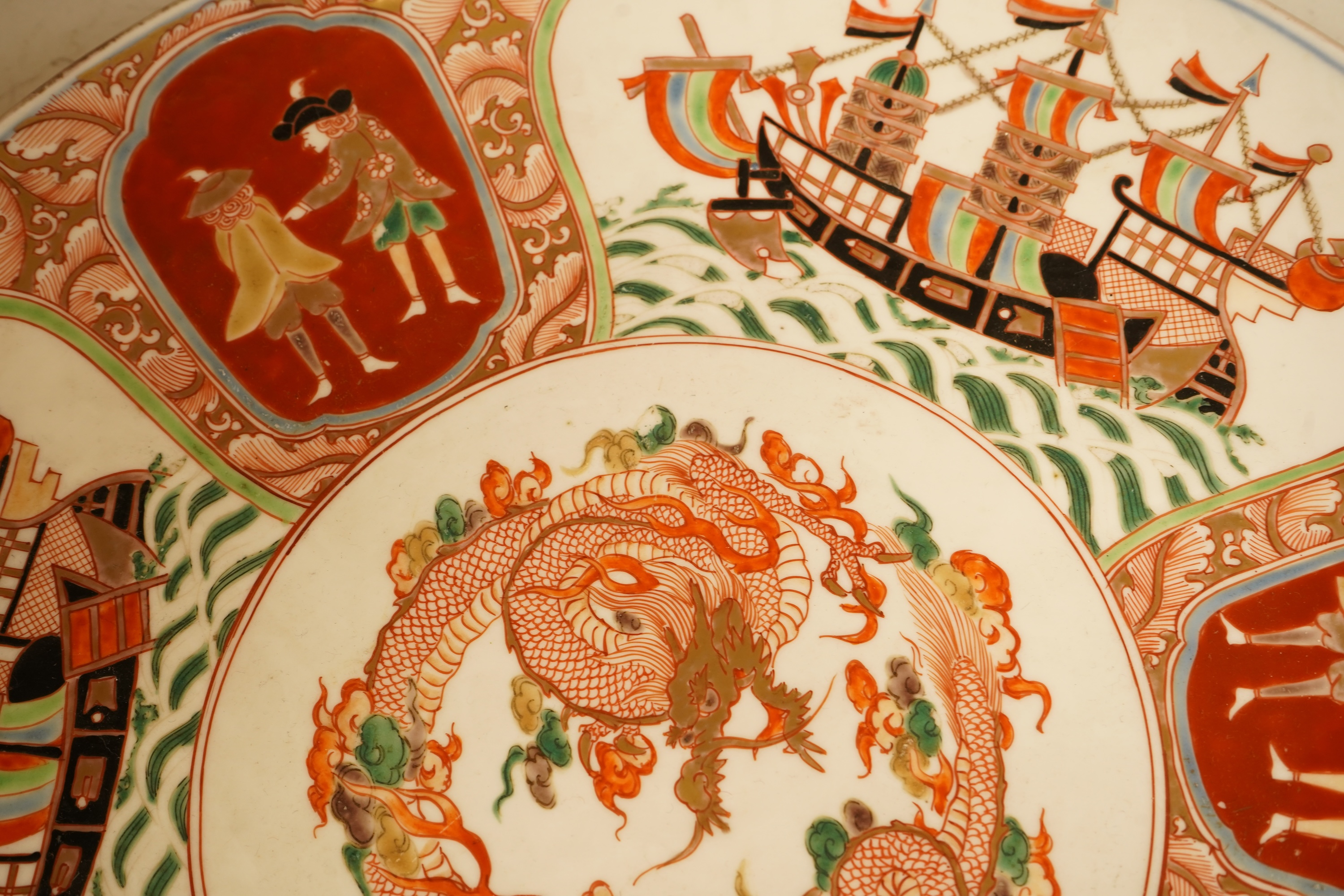 A Japanese Imari 'black ship' dish, 19th century, 36cm diameter
